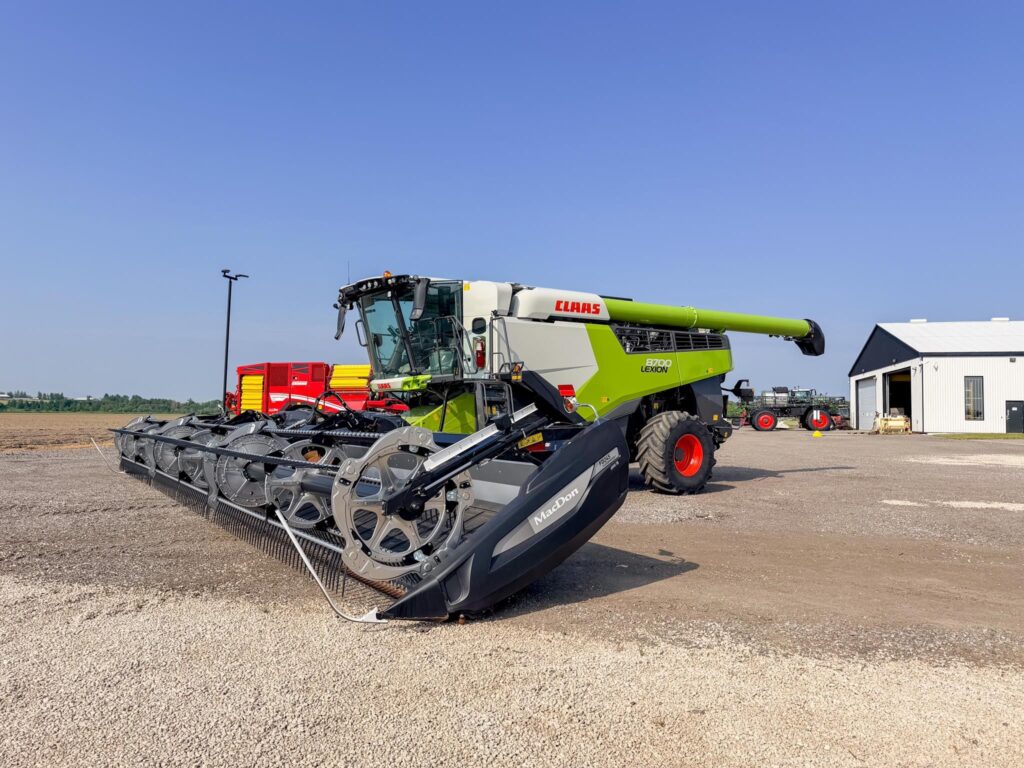 used 2024 CLAAS LEXION 8700TT combines with 625 HP and 599 hours for sale at HJV Equipment Winchester, ON — exterior front