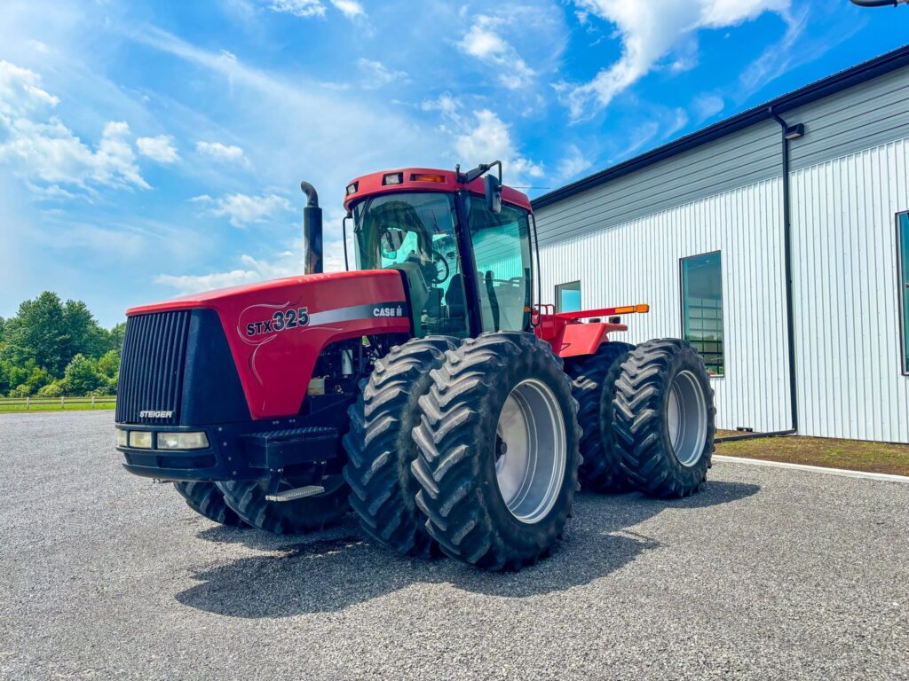used 2002 CASE IH STX325 300 hp or greater with 325 HP and 5900 hours for sale at HJV Equipment Winchester, ON — exterior front