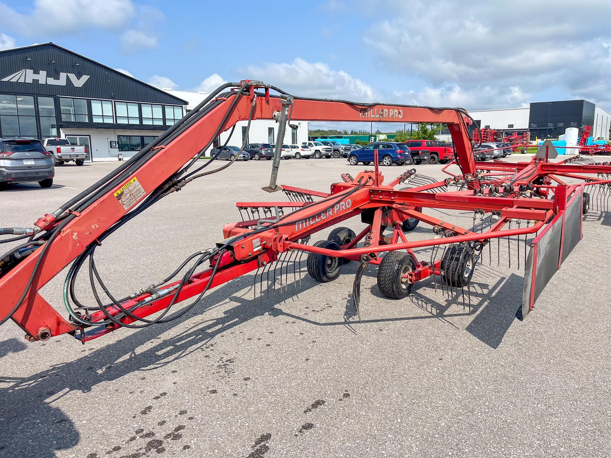 used MILLER PRO 1150 hay rakes for sale at HJV Equipment Alliston, ON — exterior front